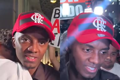 Andrew, com boné do Flamengo, durante chegada ao Rio de Janeiro