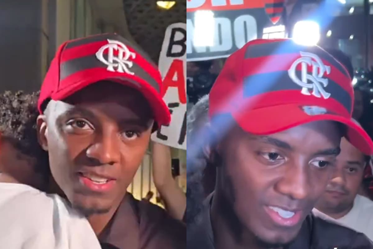 Andrew, com boné do Flamengo, durante chegada ao Rio de Janeiro